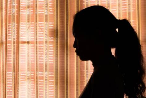 Silhouette of a woman dealing with depression. (Getty Images)